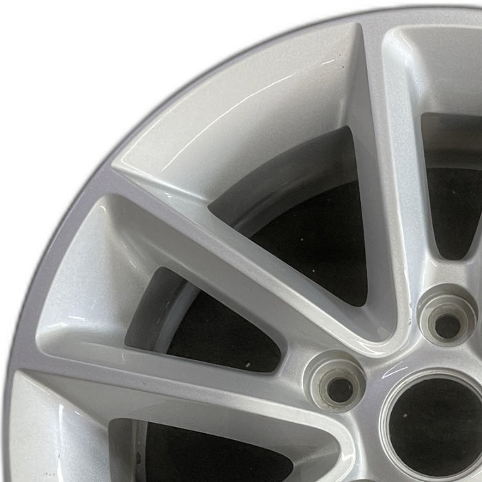 17" CARAVAN 13 17x6.5 aluminum V spoke fully opt WGH Original OEM Wheel Rim - Angle View