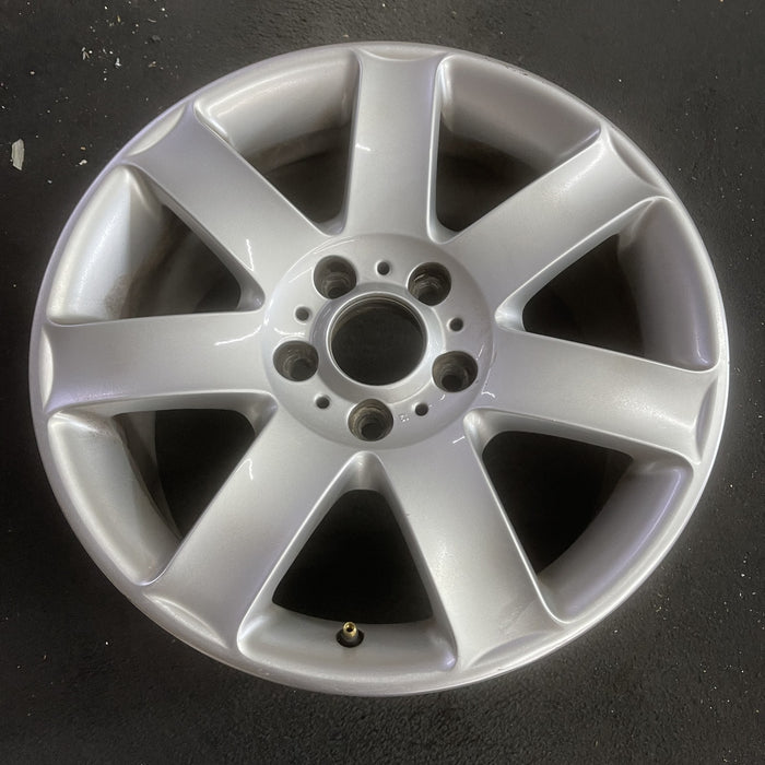 17" BMW 320i 01-05 , 17x8 , 7 spoke, exposed lug nuts, flat spoke Original OEM - Side Profile
