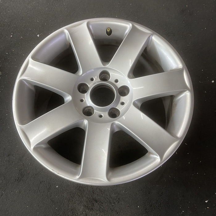 17" BMW 320i 01-05 , 17x8 , 7 spoke, exposed lug nuts, flat spoke Original OEM - Close-Up Detail