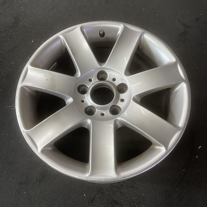 17" BMW 320i 01-05 , 17x8 , 7 spoke, exposed lug nuts, flat spoke Original OEM - Close-Up Detail