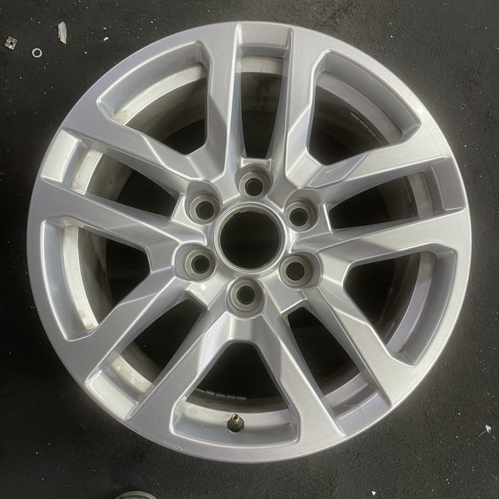 18" SIERRA 1500 PICKUP 19 , 18x8.5, 10 spoke, silver Original OEM Wheel Rim - Angle View
