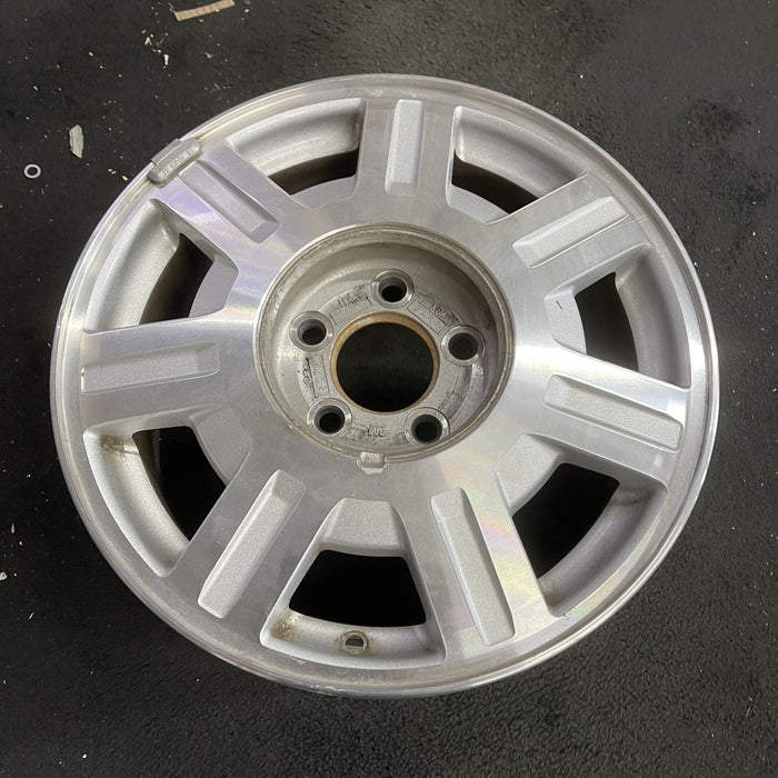 16" DEVILLE 03-05 5 lug, Base, 16x7, , silver finish Original OEM Wheel Rim - Side Profile