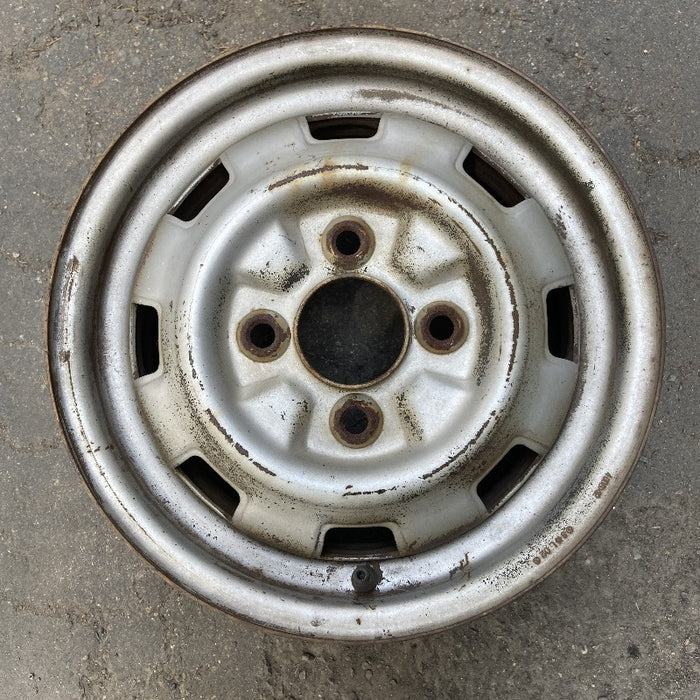 12" FIREFLY 85-86 , silver Original OEM Wheel Rim - Front View