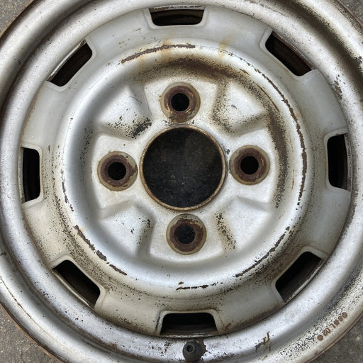 12" FIREFLY 85-86 , silver Original OEM Wheel Rim - Angle View