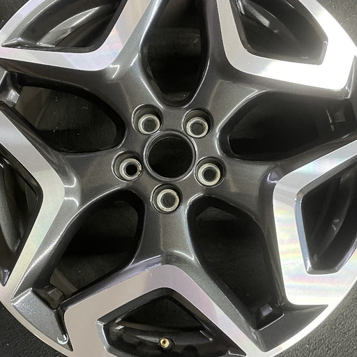 18" XV CROSSTREK 18 18x7 alloy w/machined face Limited dark gray Original OEM - Angle View