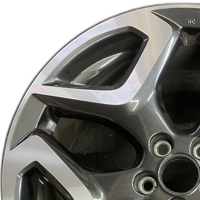 18" XV CROSSTREK 18 18x7 alloy w/machined face Limited dark gray Original OEM - Angle View