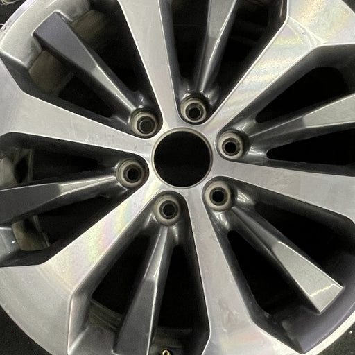 20" FORD F150 PICKUP 17 20x8.5 12 spoke machined face flash gray pockets - Angle View