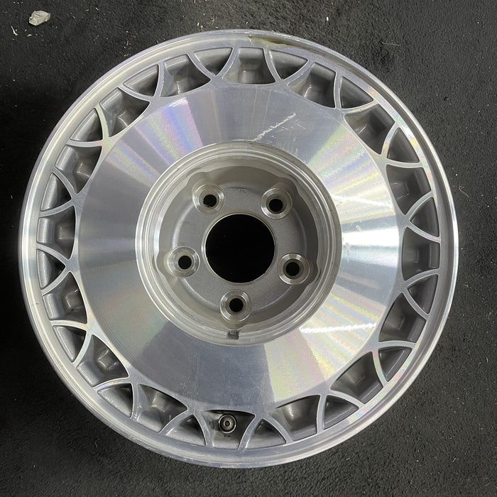 15" FLEETWOOD 93 RWD, 15x7 , web design Original OEM Wheel Rim - Angle View