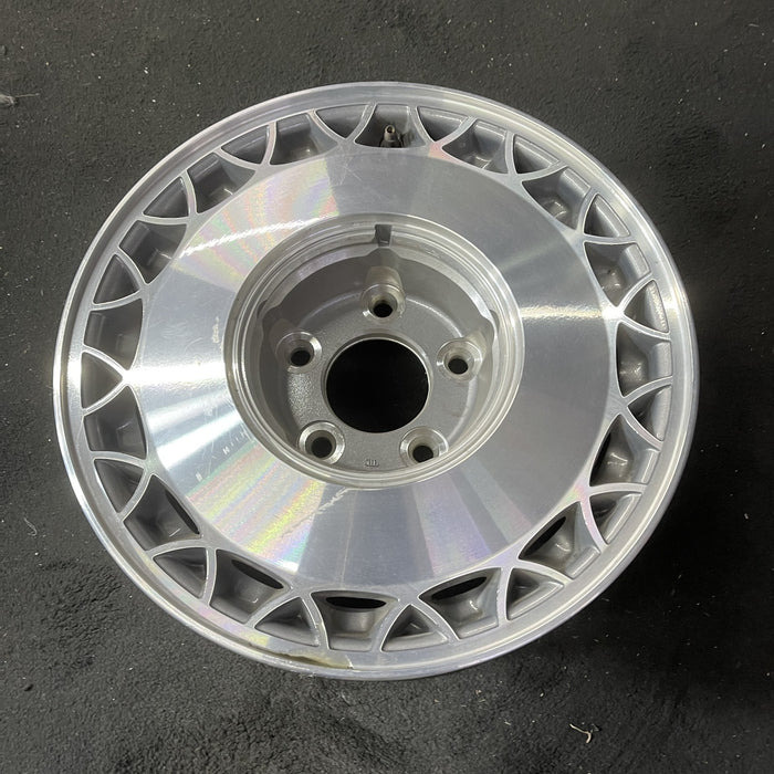 15" FLEETWOOD 93 RWD, 15x7 , web design Original OEM Wheel Rim - Close-Up Detail