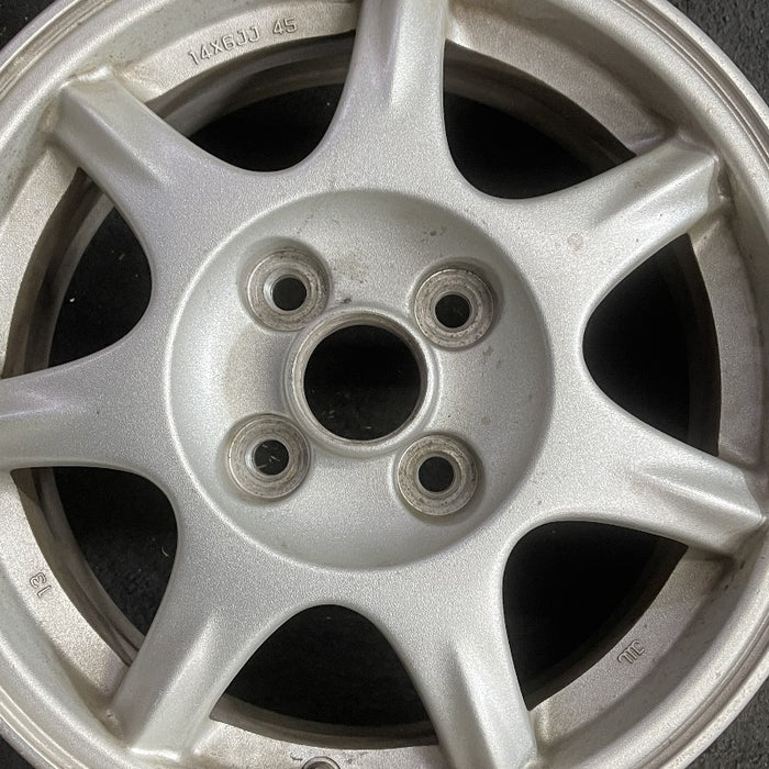 14" MAZDA MX-5 MIATA 94 14x6 alloy 7 spoke pewter Original OEM Wheel Rim - Angle View
