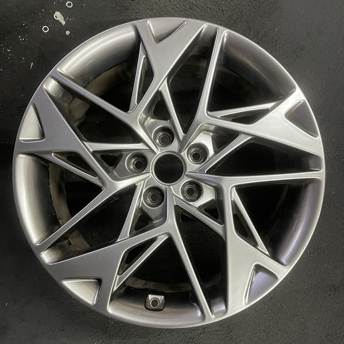 19" GV70 22-24 19x8 , twisted spoke Original OEM Wheel Rim - Angle View