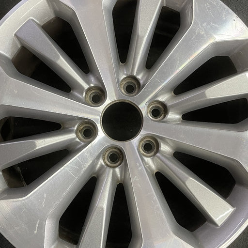 20" FORD F150 PICKUP 17 20x8.5 12 spoke machined face flash gray pockets - Angle View