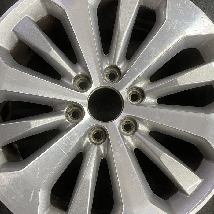 20" FORD F150 PICKUP 17 20x8.5 12 spoke machined face flash gray pockets - Angle View
