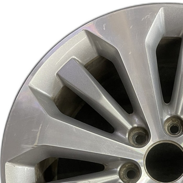 20" FORD F150 PICKUP 17 20x8.5 12 spoke machined face flash gray pockets - Angle View