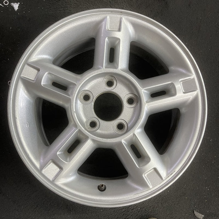 16" EXPLORER 02-03 4 Dr exc. Sport Trac; 16x7 aluminum 5 double spokes w/openings in spokes sparkle silver finish Original OEM Wheel Rim