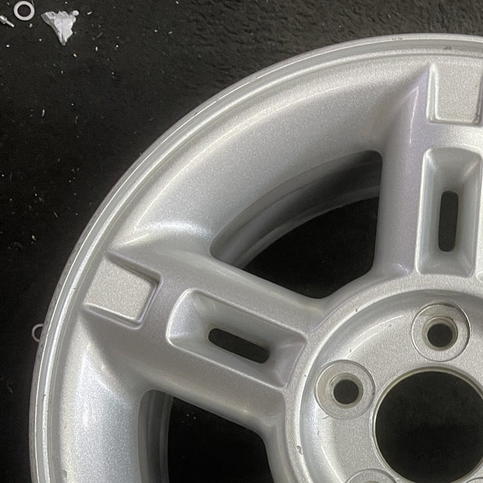 16" EXPLORER 02-03 4 Dr exc. Sport Trac; 16x7 aluminum 5 double spokes w/openings in spokes sparkle silver finish Original OEM Wheel Rim