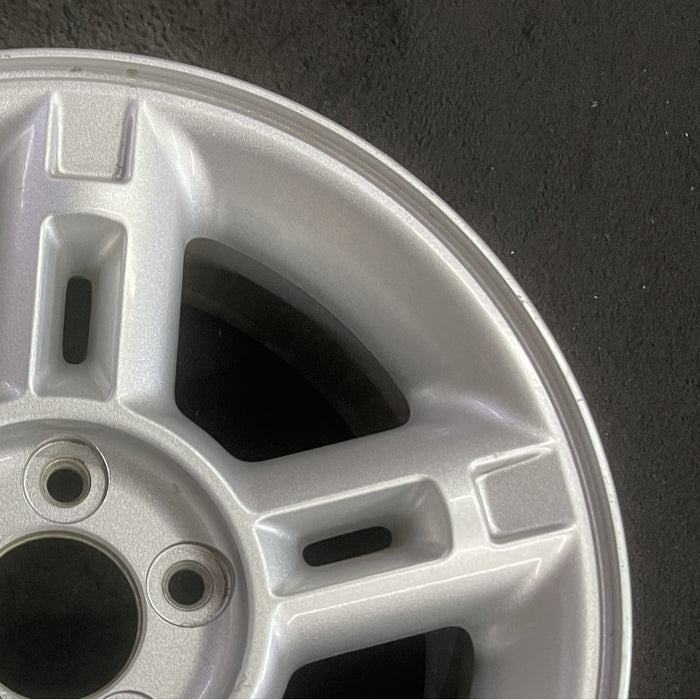 16" EXPLORER 02-03 4 Dr exc. Sport Trac; 16x7 aluminum 5 double spokes w/openings in spokes sparkle silver finish Original OEM Wheel Rim