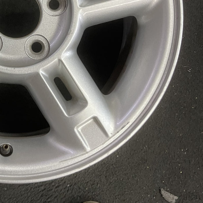 16" EXPLORER 02-03 4 Dr exc. Sport Trac; 16x7 aluminum 5 double spokes w/openings in spokes sparkle silver finish Original OEM Wheel Rim