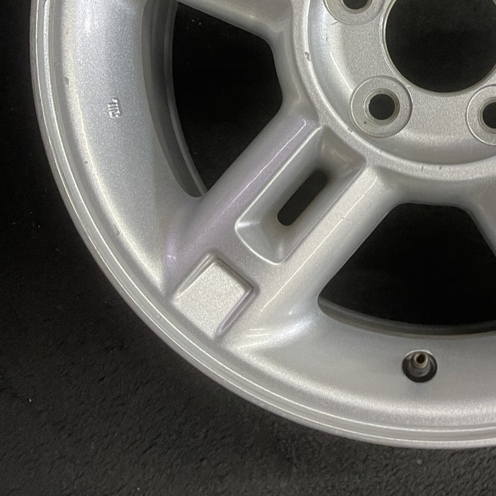 16" EXPLORER 02-03 4 Dr exc. Sport Trac; 16x7 aluminum 5 double spokes w/openings in spokes sparkle silver finish Original OEM Wheel Rim