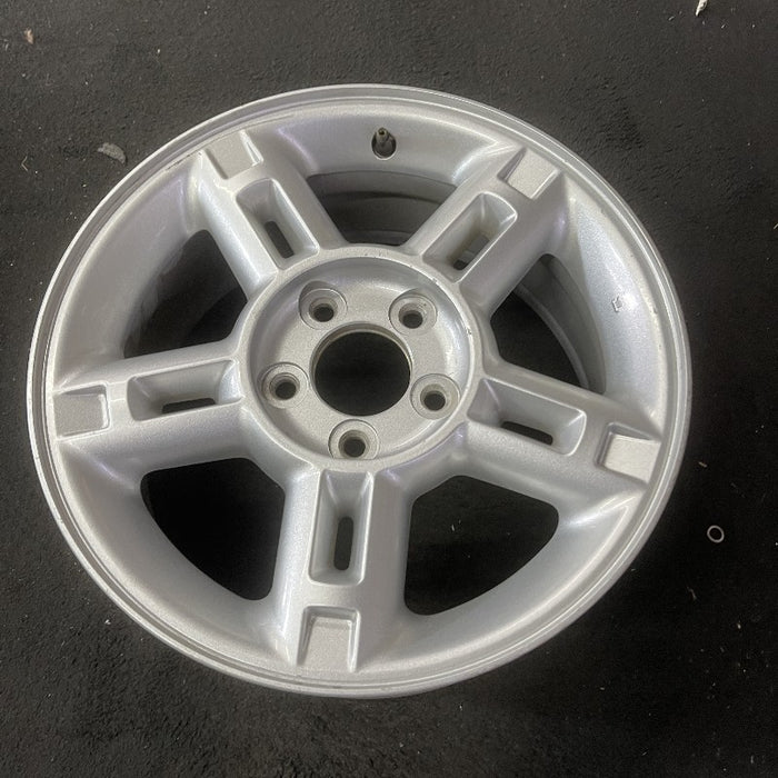 16" EXPLORER 02-03 4 Dr exc. Sport Trac; 16x7 aluminum 5 double spokes w/openings in spokes sparkle silver finish Original OEM Wheel Rim