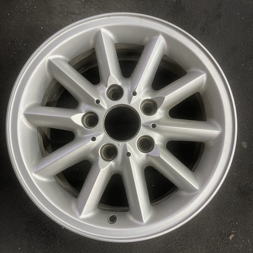 15" BMW 318i 95-99 15x7 , 10 spoke, round spoke Original OEM Wheel Rim - Angle View