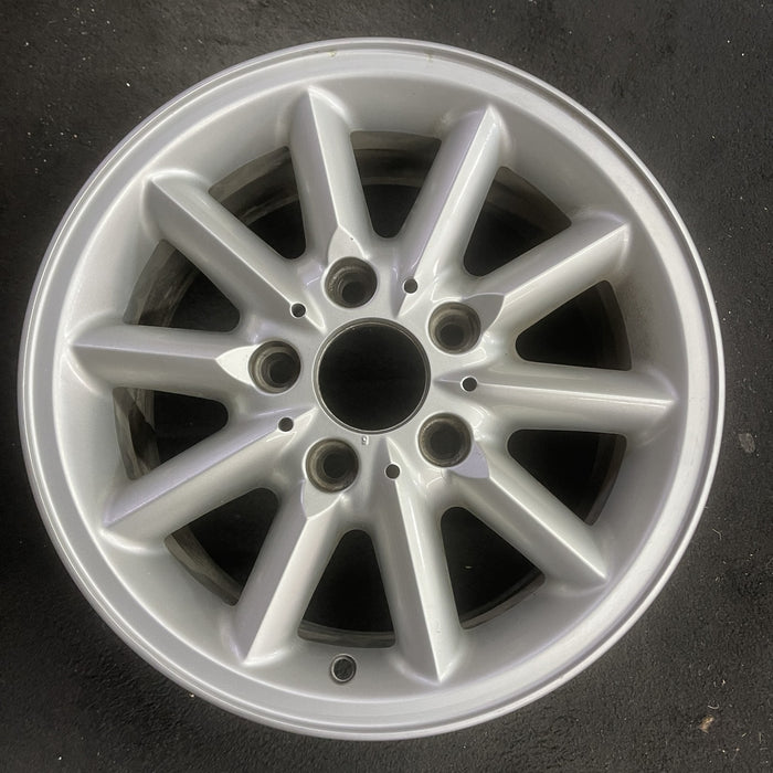 15" BMW 318i 95-99 15x7 , 10 spoke, round spoke Original OEM Wheel Rim - Angle View