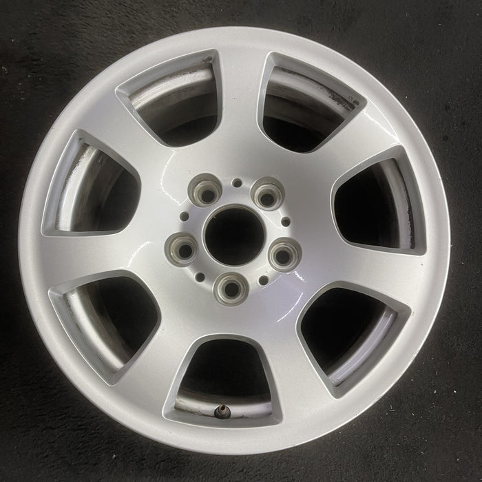 16" BMW 525i 04-07 16x7 , 7 spoke, trapezoid holes Original OEM Wheel Rim - Angle View