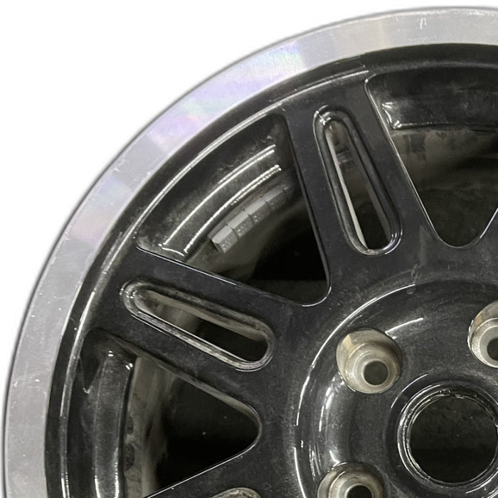 17" WRANGLER 09-10 17x7.5 8 split spokes machined spokes with black pockets - Angle View
