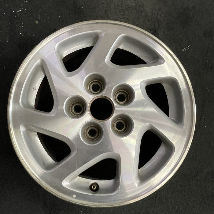 15" MAXIMA 95-96 15x6.5 , 7 spoke Original OEM Wheel Rim - Angle View