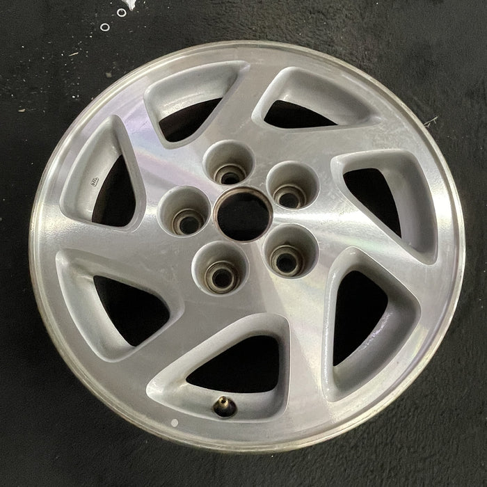 15" MAXIMA 95-96 15x6.5 , 7 spoke Original OEM Wheel Rim - Side Profile