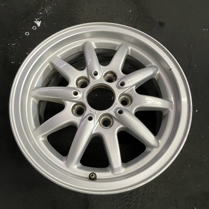 15" BMW 318i 95-96 15x7 , 10 spoke, flat face spoke, alternating spoke height - Side Profile