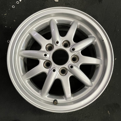 15" BMW 318i 95-96 15x7 , 10 spoke, flat face spoke, alternating spoke height - Angle View