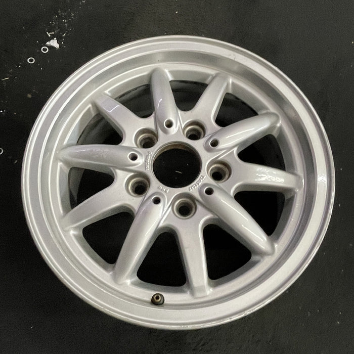 15" BMW 318i 95-96 15x7 , 10 spoke, flat face spoke, alternating spoke height - Side Profile