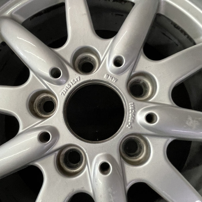 15" BMW 318i 95-96 15x7 , 10 spoke, flat face spoke, alternating spoke height - Back View