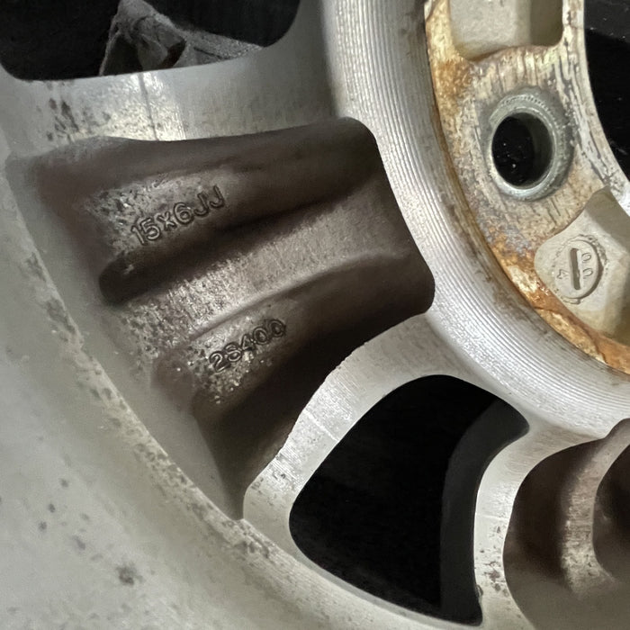 15" FRONTIER 98-00 4x2, 15x6, alloy Original OEM Wheel Rim