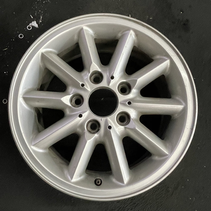 15" BMW 318i 95-99 15x7 , 10 spoke, round spoke Original OEM Wheel Rim - Angle View
