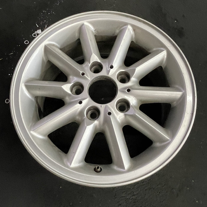 15" BMW 318i 95-99 15x7 , 10 spoke, round spoke Original OEM Wheel Rim - Side Profile