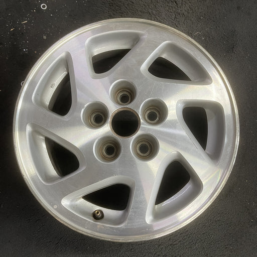15" MAXIMA 95-96 15x6.5 , 7 spoke Original OEM Wheel Rim - Angle View
