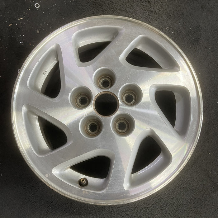 15" MAXIMA 95-96 15x6.5 , 7 spoke Original OEM Wheel Rim - Angle View