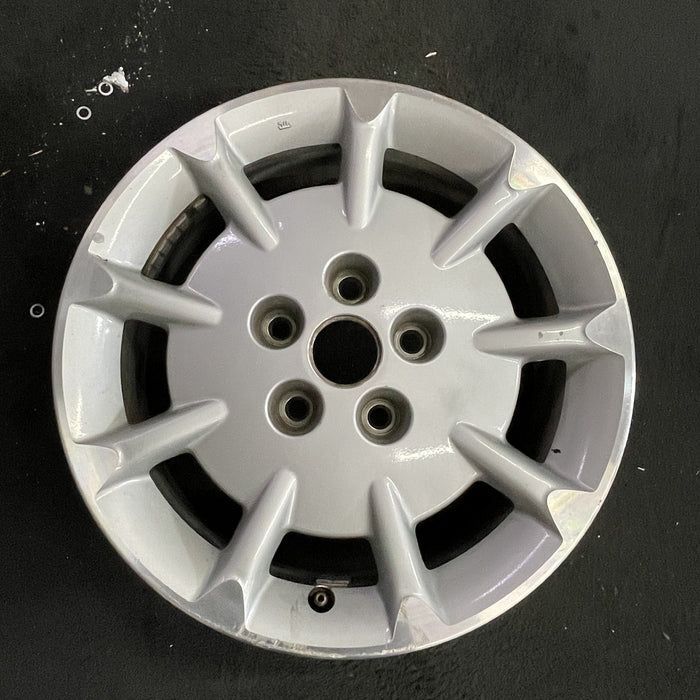 16" MAXIMA 00-01 16x6.5, alloy, 9 spoke Original OEM Wheel Rim - Angle View