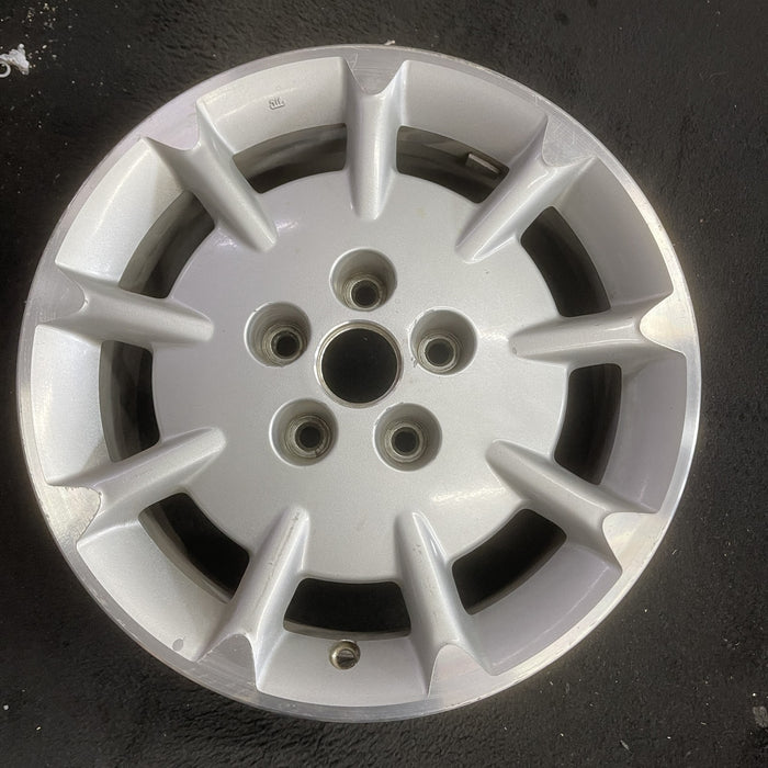 16" MAXIMA 00-01 16x6.5, alloy, 9 spoke Original OEM Wheel Rim - Angle View