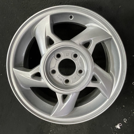 16" GRAND AM 02-05 16x6.5, 5 spoke, silver Original OEM Wheel Rim - Angle View