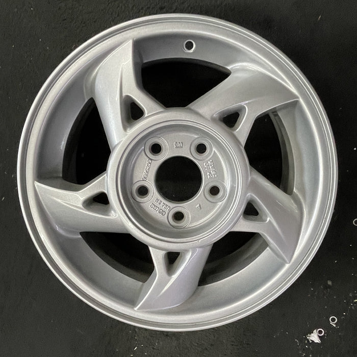 16" GRAND AM 02-05 16x6.5, 5 spoke, silver Original OEM Wheel Rim - Angle View