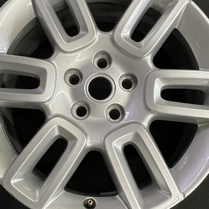 19" DEFENDER 20-22 19x8 6 spoke straight spoke silver Original OEM Wheel Rim - Angle View