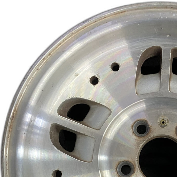 14" RANGER 95 14x6 aluminum w/10 small holes 10 ovals Original OEM Wheel Rim - Angle View