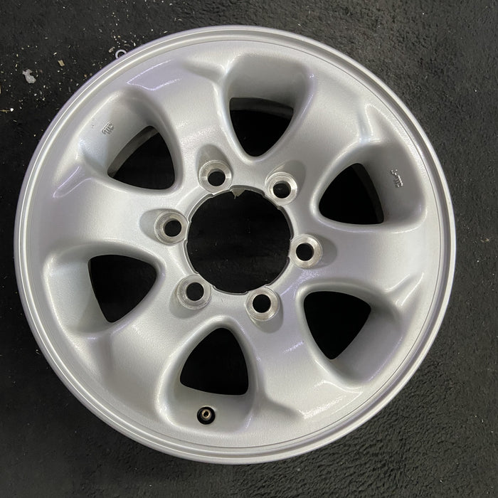 15" MONTERO 94-02 15x6, alloy Original OEM Wheel Rim