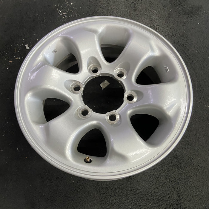 15" MONTERO 94-02 15x6, alloy Original OEM Wheel Rim