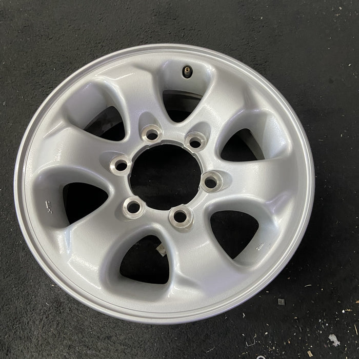 15" MONTERO 94-02 15x6, alloy Original OEM Wheel Rim