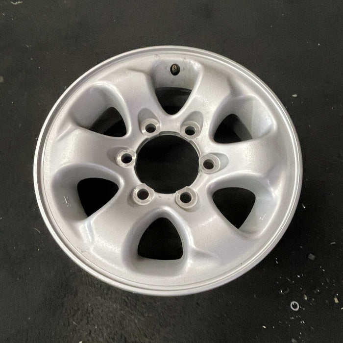 15" MONTERO 94-02 15x6, alloy Original OEM Wheel Rim - Close-Up Detail