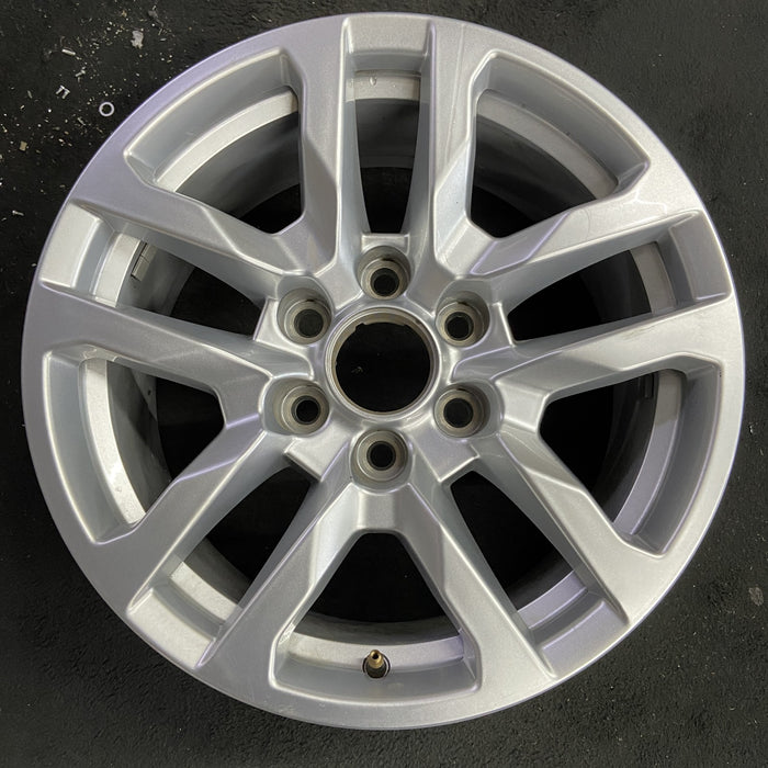 18" SIERRA 1500 PICKUP 19 , 18x8.5, 10 spoke, silver Original OEM Wheel Rim - Angle View